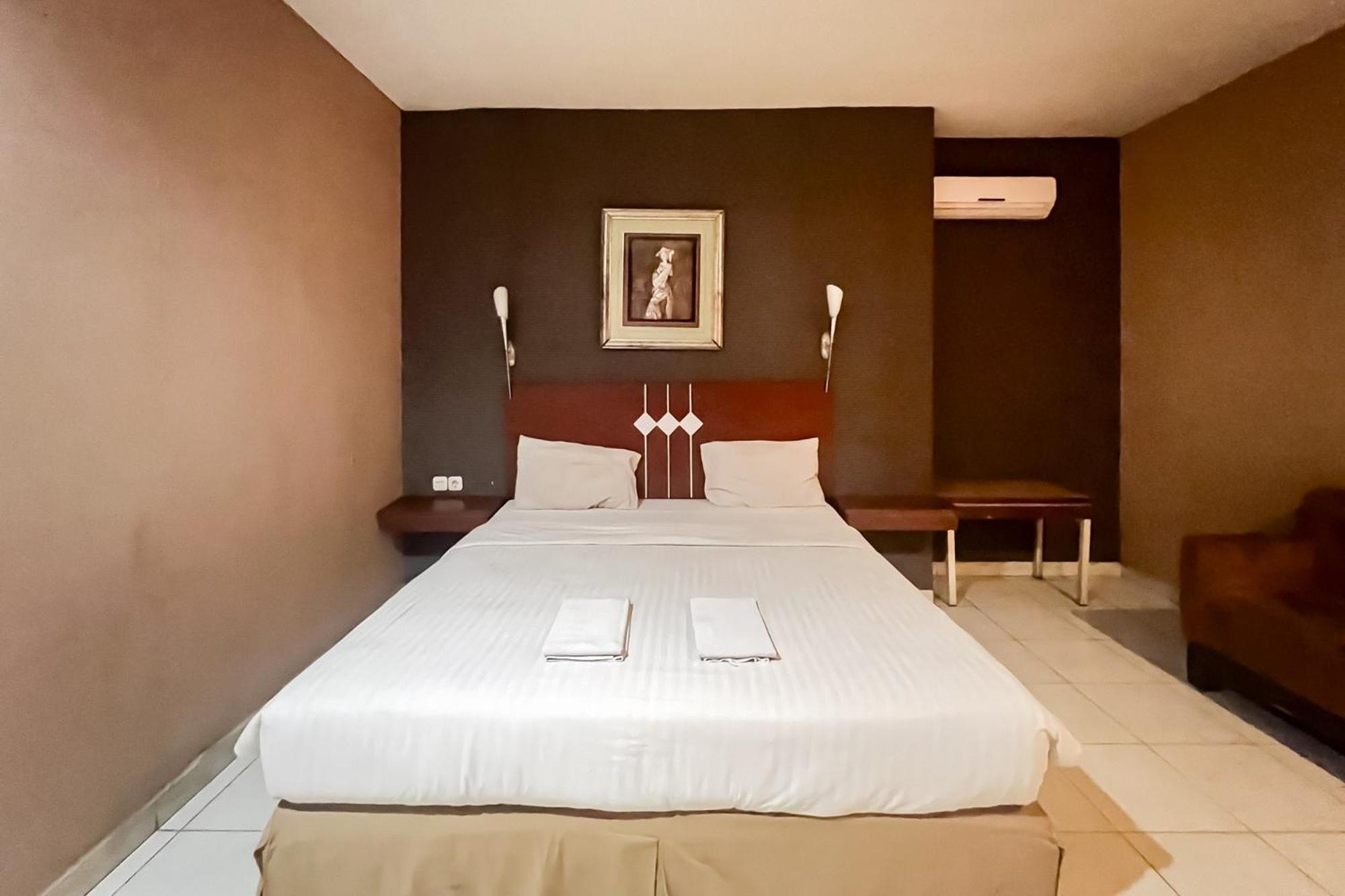 Urbanview Trisula Hotel Makassar Extérieur photo